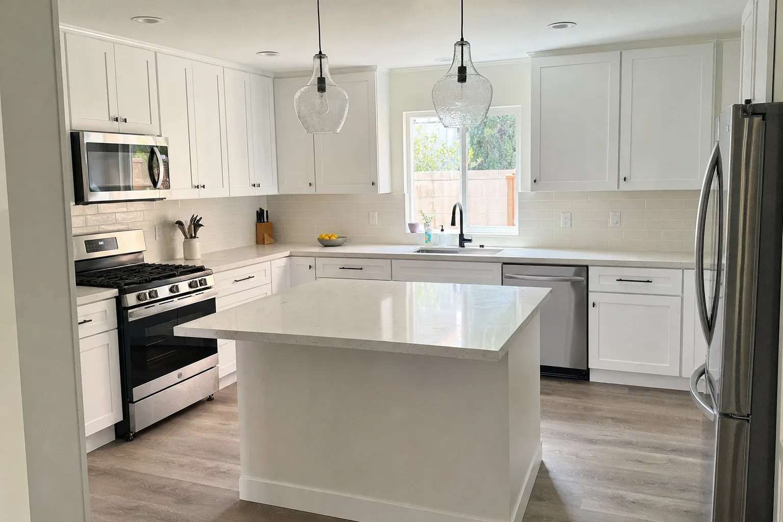 Kitchen reconstruction in Murrieta, CA: new cabinets, quartz countertops and flooring
